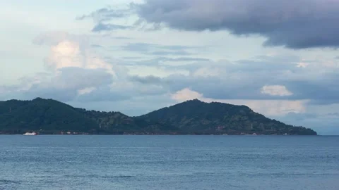 View of Candidasa Beach and Samuh and Guungan Hill at Sunset in Bali Timelapse Stock Footage 200070649