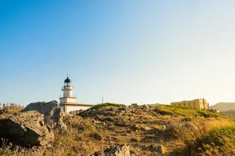 View of cap de creus lighthouse, a beacon of light on the rocky catalan costa 스톡 사진