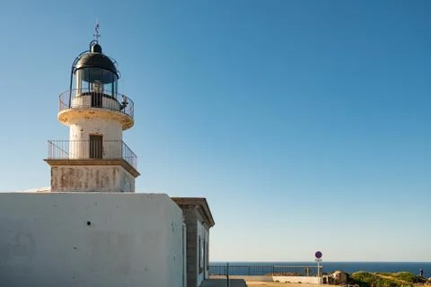 View of cap de creus lighthouse, a beacon of light on the rocky catalan costa Stock Photos