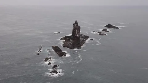 View of Cape Kamui sea stack in the ocean, Japan. Stock Footage 343679623