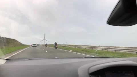 View From A Car on Cornwall Road. Motor Cycles. Windmill. Vídeo Stock 221103489