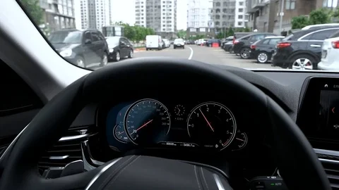 View of car dashboard while driving in city Stock Footage 89935018