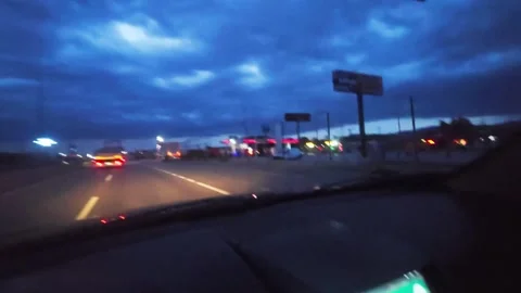 View a car driving down a highway. Stock Footage 282660730