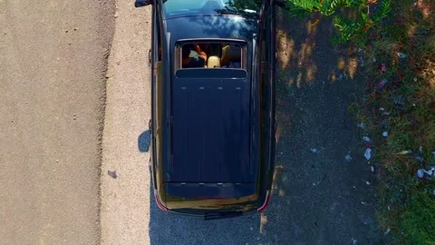 View a car driving down a road. Stock Footage 284676815