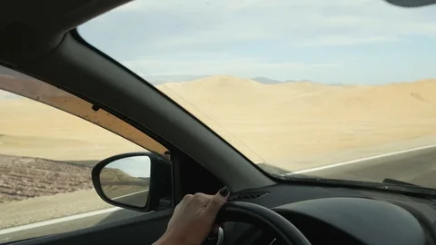 View from car on an empty picturesque mountain road in Mongolia on highway Stock Footage 127954121