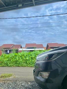 View of the car in front of the house🍃 Stock Photos