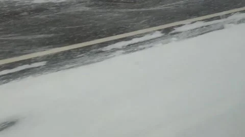 View from car to heavy snowfall on road in Russia slow motion video Stock-Footage 144643666