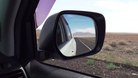 View from the car interior in the side mirror 動画素材 250541284
