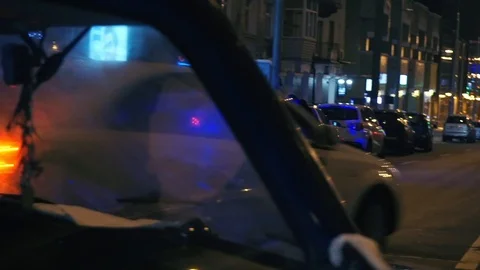 View from car interior through misted and foggy windshield on the police car Stock Footage 100842957