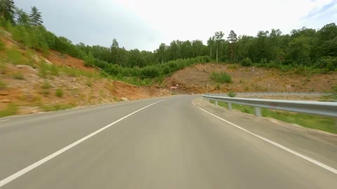 View from the car moving at speed to a high sandy hill, the slope of which is Stock Footage 158102752