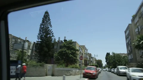 View From the Car Moving Through a Mediterranean City Stock Footage 77405750