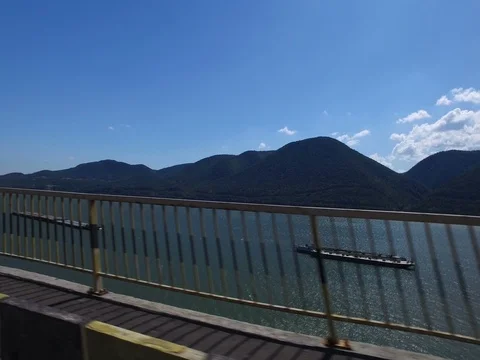 View from a car next to a river Stock Footage 72392678