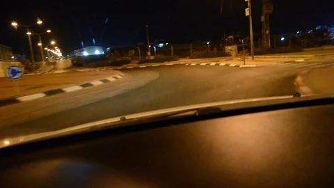 View from car on night road. Evening drive point of view on a road Stock Footage 125488645