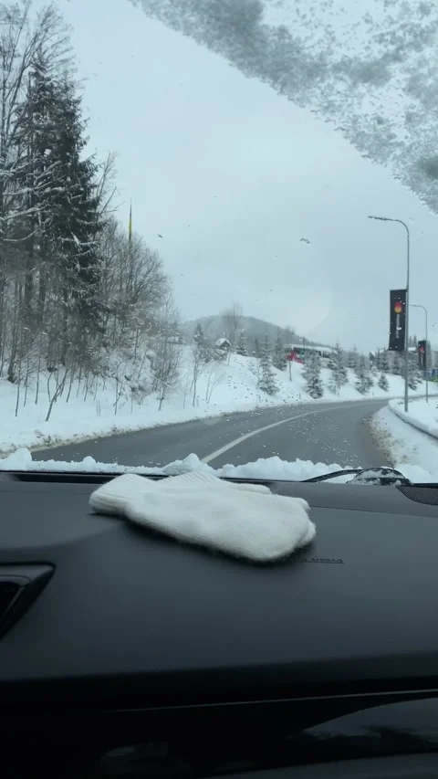 View from the car riding by winter mountain road Stock Footage 236624207