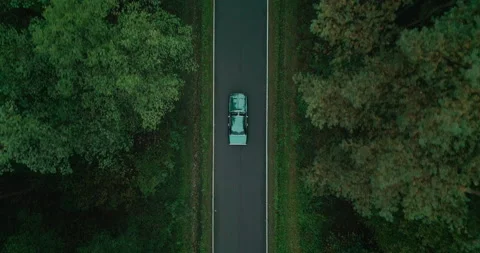 View of car on road between forests, Poland Stock Footage 147875321