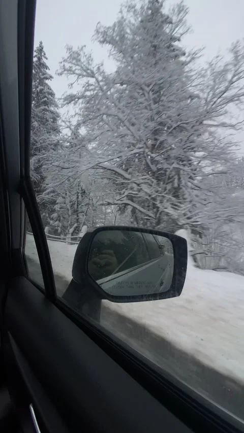 View from the car road trip by winter mountains Video stock 246668624
