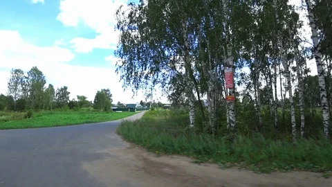 The view from the car on the side of nature and the village. Stock Footage 93896853