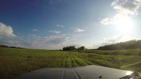View from Car. Summer Road Trip on Off Road in Sunny Day. 4K 動画素材 80100682