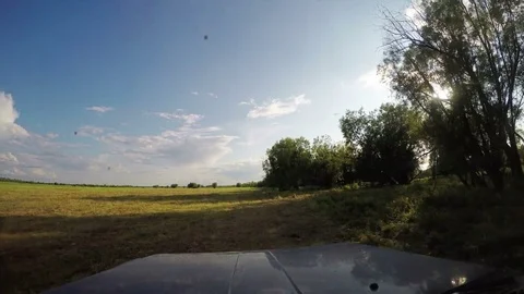 View from Car. Summer Road Trip on Off Road in Sunny Day. 4K Stock Footage 80106032