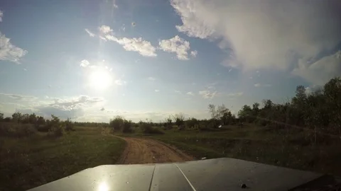 View from Car. Summer Road Trip on Off Road in Sunny Day. 4K Stock Footage 80182537