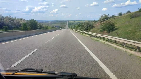 View from car while driving on the highway on sunny summer day. Panoramic view Stock Footage 316516984