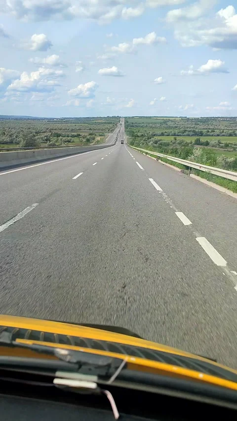View from car while driving on highway sunny summer day Panoramic view Vertical Stock Footage 316517069