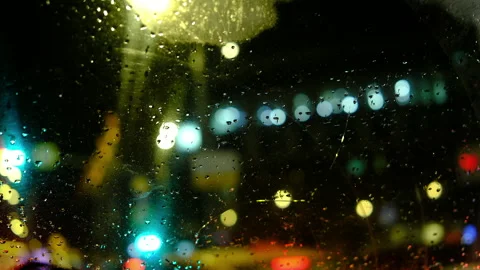 View from car window, bright lights, defocus in traffic jam Stock Footage 290132782