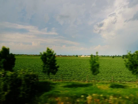 View from the car window - drive through the picturesque countryside and fields Stock Footage