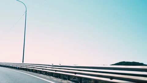 View from the car window, driving along road among the mountains. Autobahn Stock Footage 220911964