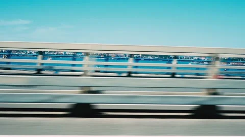 View from the car window, driving along road among the mountains. Bridge Stock Footage 220912337