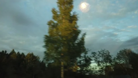 View from the car window on the evening summer sky Stock Footage 117277966