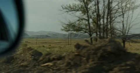View from the car window on the field Stock Footage 232014291