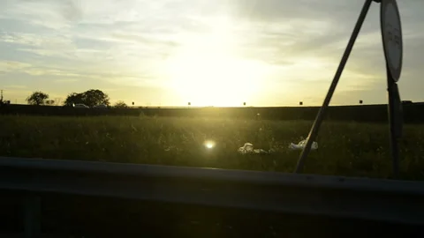 View from the car window to the fields and motorway Video stock 102112340