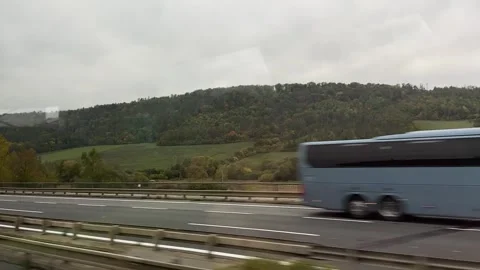 View from the car window on the highway. Car trip across Europe. Car trip along Stock Footage 309007802