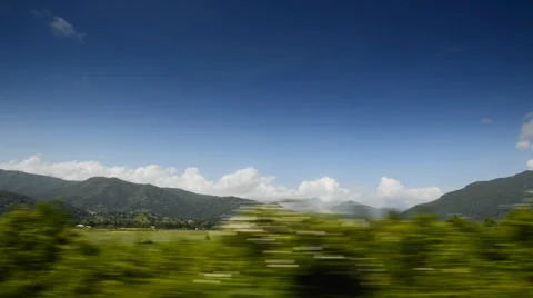 The view from the car window of the mountains and the forest Stockbeeldmateriaal 62403567