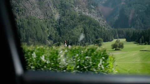 View from the car window on the nature of the mountains during a trip. Stock Footage 343737311