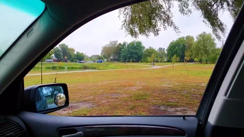 The view from the car window to the park Stock Footage 140736117