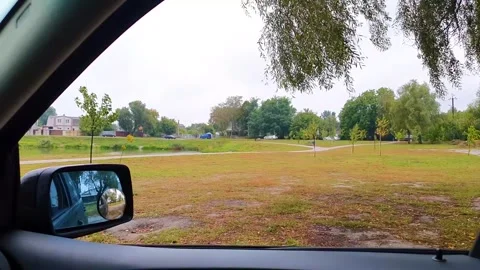The view from the car window to the park Stock Footage 140736129