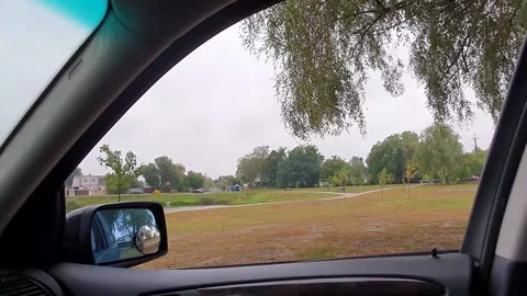 The view from the car window to the park Stock Footage 140736130