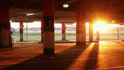 View from the car window at the rays of the red sun while driving. Video stock 201297167