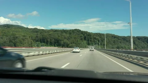 View from car window of road clear blue sky in summer sunny day. Nature. Car Vidéo 158284598