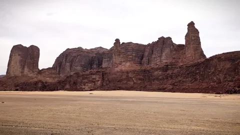 View from a car window with rocky mountains when driving at Alula Saudi Arabia Stock Footage 277230774