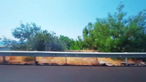 View from the car window to the sea beach and sand in Turkey. Beautiful nature 스톡 동영상 303621236