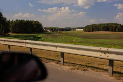 View from the car window to the side of the road, autumn landscape 스톡 사진