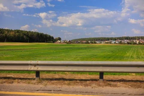 View from the car window to the side of the road, autumn landscape 스톡 사진