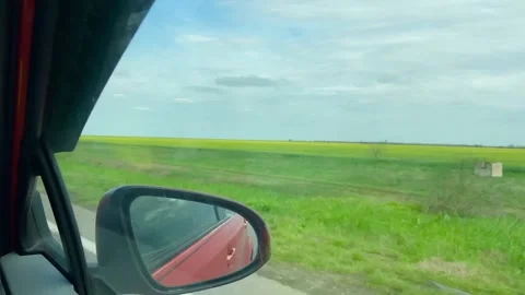 View from the car window. Spring. Road in Ukraine. Stock Footage 240999545