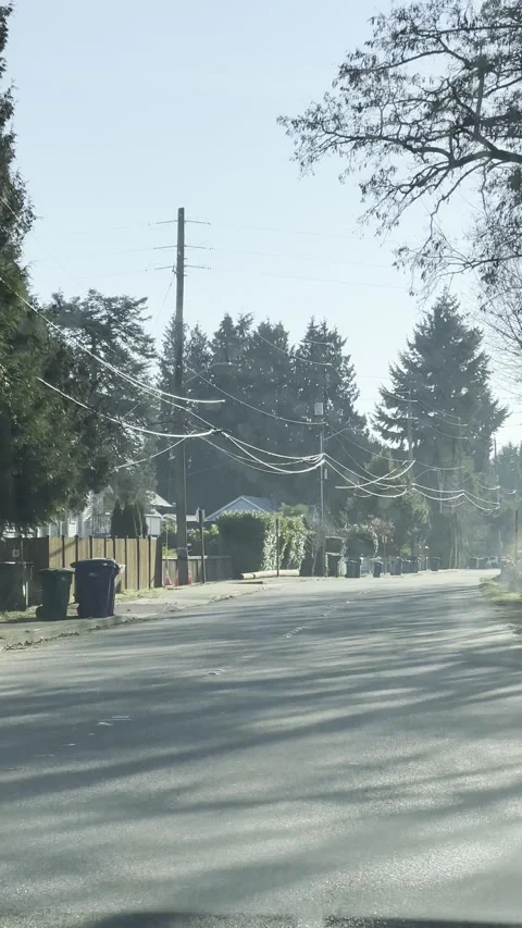 The view from the car window the street is empty in the morning in the village Stock Footage 241005164