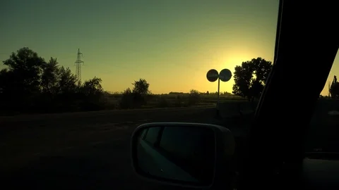 View from the car window at sunset Vídeo Stock 107686582