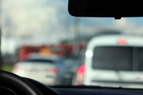 View from the car window on the traffic jam, blurred background. Photos