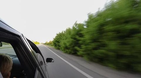 View from the car window while driving Stock Photos